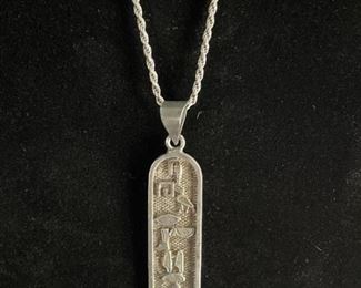 Sterling Silver rope chain Necklace with an
Egyptian styled Pendant the chain is 10.5 inches the pendant is not marked total weight is 10 grams the chain is 5 grams.