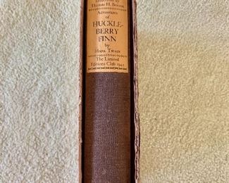 $300 - “Adventures of Huckleberry Finn” by Mark Twain; The Limited Editions Club, 1941; signed by the illustrator Thomas Hart Benton and numbered 186/1500