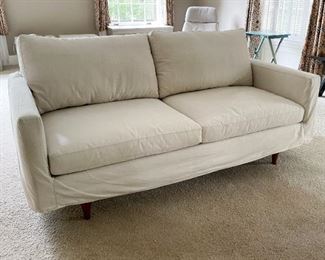 LOT #108 - $1,200 - Room & Board Slip-Covered Loveseat Sofa (approx. 70" L x 36.75" W x 31.5" H at the back)
