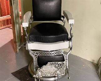 LOT #119 - $600 - Koken Barber Chair (some damage, see photos)