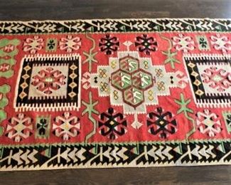 Flat weave rug. Priced at $750.00  5' x 10'                                         This item is at the West location.