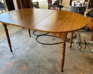 Kitchen table with removable leaf