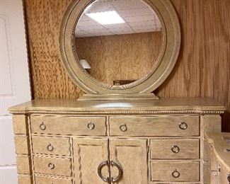Ortanique dresser & mirror - has 2 matching nightstand drawer, headboard & footboard.  These are VERY heavy because they are solid wood, so you MUST bring tools to remove it.