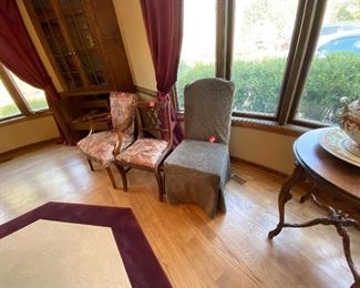 needlepoint and assorted chairs