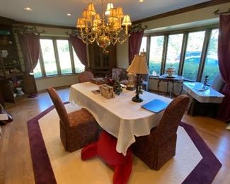 rug, table chairs, chandelier