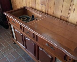 Vintage stereo in a cherry cabinet