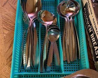 Mixed mod stainless flatware inc. Carvel Hall, others with blue basket