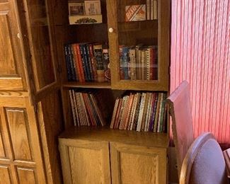 Glass front hutch with storage measures approximately  6' tall and 30" width