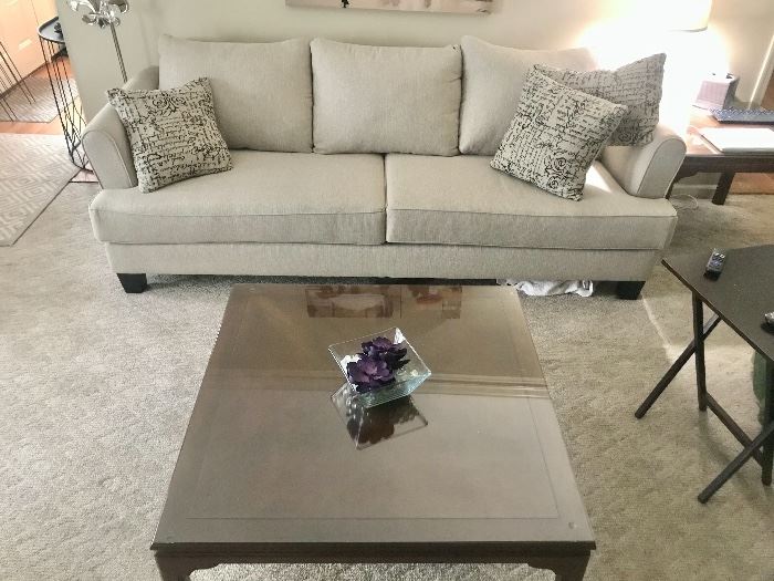 Nearly new neutral colored sofa.