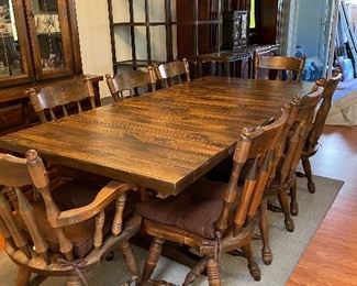 Solid wood dining room table with chairs and center leaf, sits eight people comfortably  $150.00 dollars