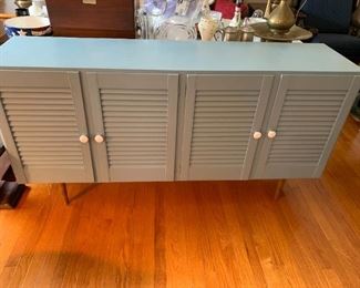 #18	Blue Painted Cabinet w/4 doors & 1 Shelf  65x16x33	 $75.00 
