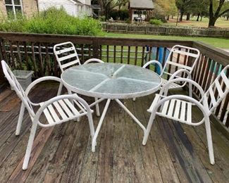#43	Round Glass top Table w/4 chairs w/plastic Back  42x28	 $65.00 
