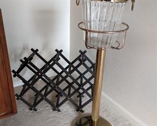 Gold trimmed champagne bucket on stand