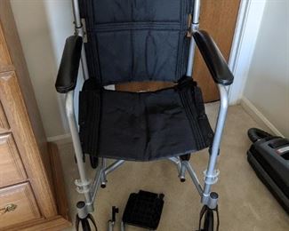 Transport wheelchair