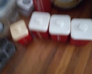 63. VINTAGE CANISTER SET $20