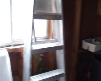 75. 6 FOOT ALUMINUM LADDER $15