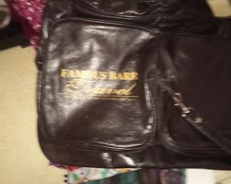 109.  FAMOUS BARR TRAVEL BAG $15