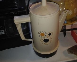 199. VINYL COFFEE POT $10