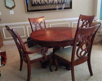 Very nice round dining or kitchen table with four chairs. Fine furniture. $450.00
