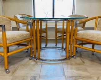 Chrome, bamboo glass top dinette
chairs on casters by Windwood