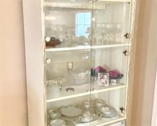27-	Display case with mirror bottom 80” x 34”W x 19”D @$150 each section