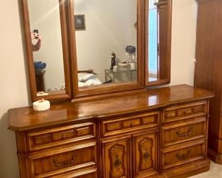 40. $250 Triple dresser with mirror 73”L x 20”W x 31”H to cabinet + 50”H mirror – Stanley 									