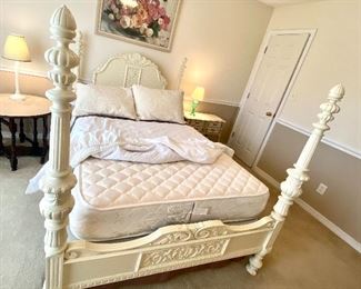 48. Full size bed 57”  four poster cream 					$395