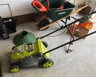 BATTERY POWERED LAWN MOWER.