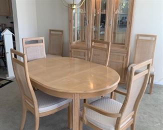 Table with 2 leaves and 6 matching chairs  by Stanley 