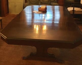 Antique dining table (1922) with three large leaves.