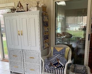 Vintage wicker rocking chair and table. Cabinet on top of 2 wicker side tables, 2 screws would remove cabinet or use as is for t.v./storage. 