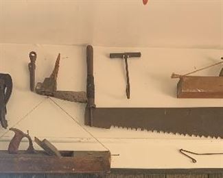 Antique farm tools & planers. 
