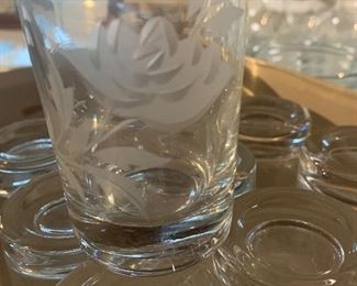 Set of 12 etched glass juice glasses. 