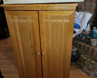 80.00 each, solid cherry CD/DVD storage cabinets new in box (2 available) 39" tall by 24" wide