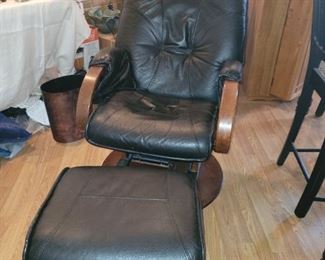 $300 Avantglide , gliding swivel chair and ottoman