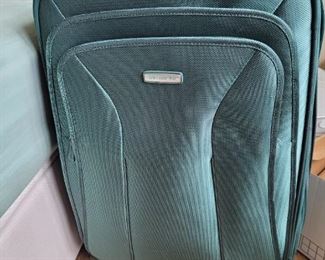 $15.00, Large green Samsonite suitcase vg