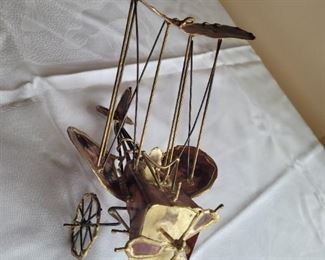 $25.00, Areal metal sculpture plane,10 x 7"