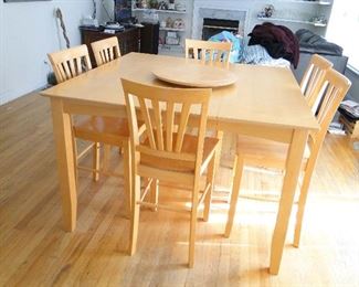 Tall Bistro style Kitchen/Dining Table leaf inside and 6 chairs - maple - $275 lazy Susan included.