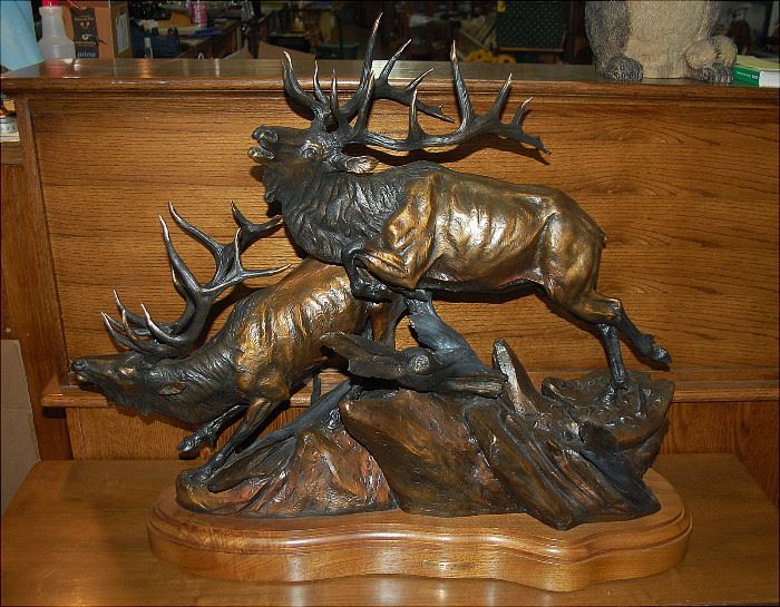 36 inch e wide Bronze Sculpture by Vic Payne titled "Thunder On The Mountain" 36x30x16 and weighs about 150lbs on swivel walnut base