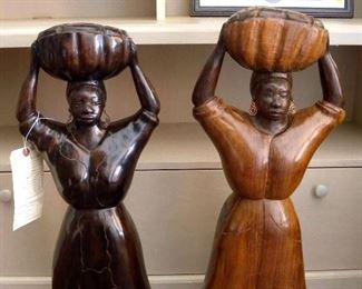 Two large Caribbean Wooden Sculptures stand 30 inches tall