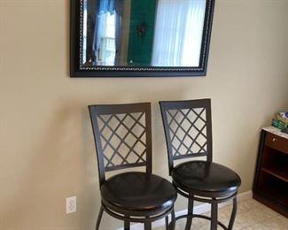 Two Swivel Barstools and Framed Mirror