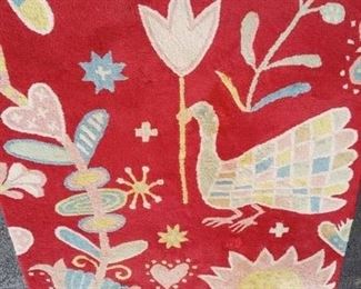 Red patterned area rug