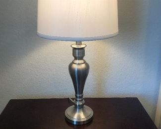 Two brushed nickel lamps, touch to turn on.