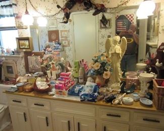 Bathroom Supplies plus framed pictures and ceramic Angel.