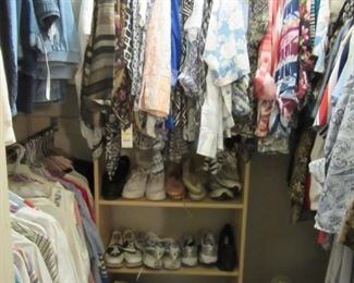 Ladies clothing and shoes galore, assorted sizes.