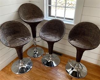 Item 18: (2) Rattan Bar Stools, adjustable height and chrome bases -16”l x 12.5”w x 31.5”: $75 ea (TWO SOLD)