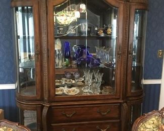 Antique-look china cabinet with curved glass. 90" high, 66" wide, 19" deep.  