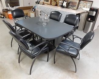 Formica top table and 6 chairs $25 for everything