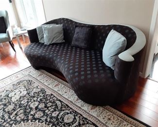 Modern colorful upholstered Serpentine sofa black and blue polka dot one of four pieces $1,200