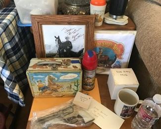 Gene Autry Autographed photo, tshirt, lunch box and thermos, cap gun and mug.  Orphan Annie Childs cup